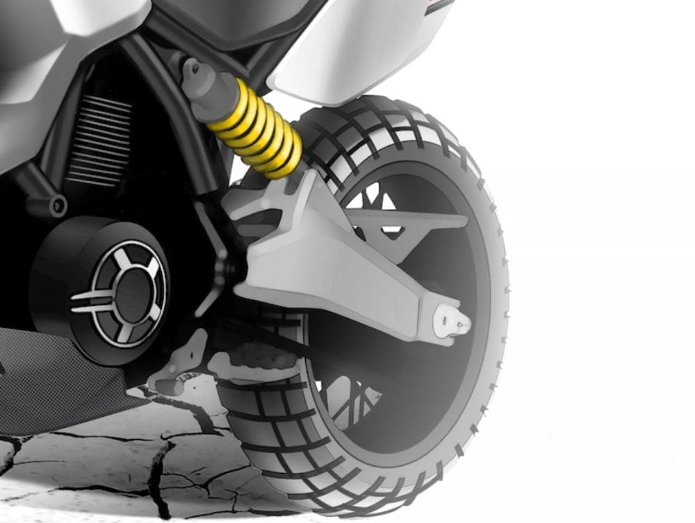 Current Scrambler rear shock and swingarm set-up look likely to be used. 