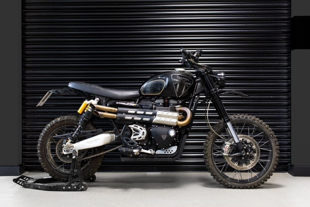 This is the Scrambler 1200 that James Bond rides up the side of an old castle in No Time To Die. Or it's one of the ones made for the new film, at least. Either way, it looks trick - very trick. 