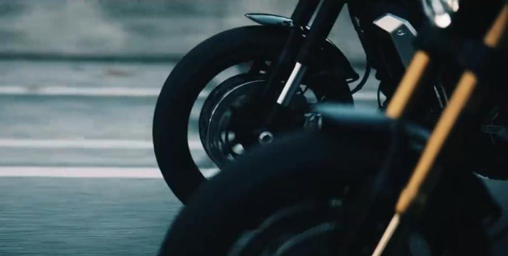 Two versions of the bike are seen riding side-by-side in the video.