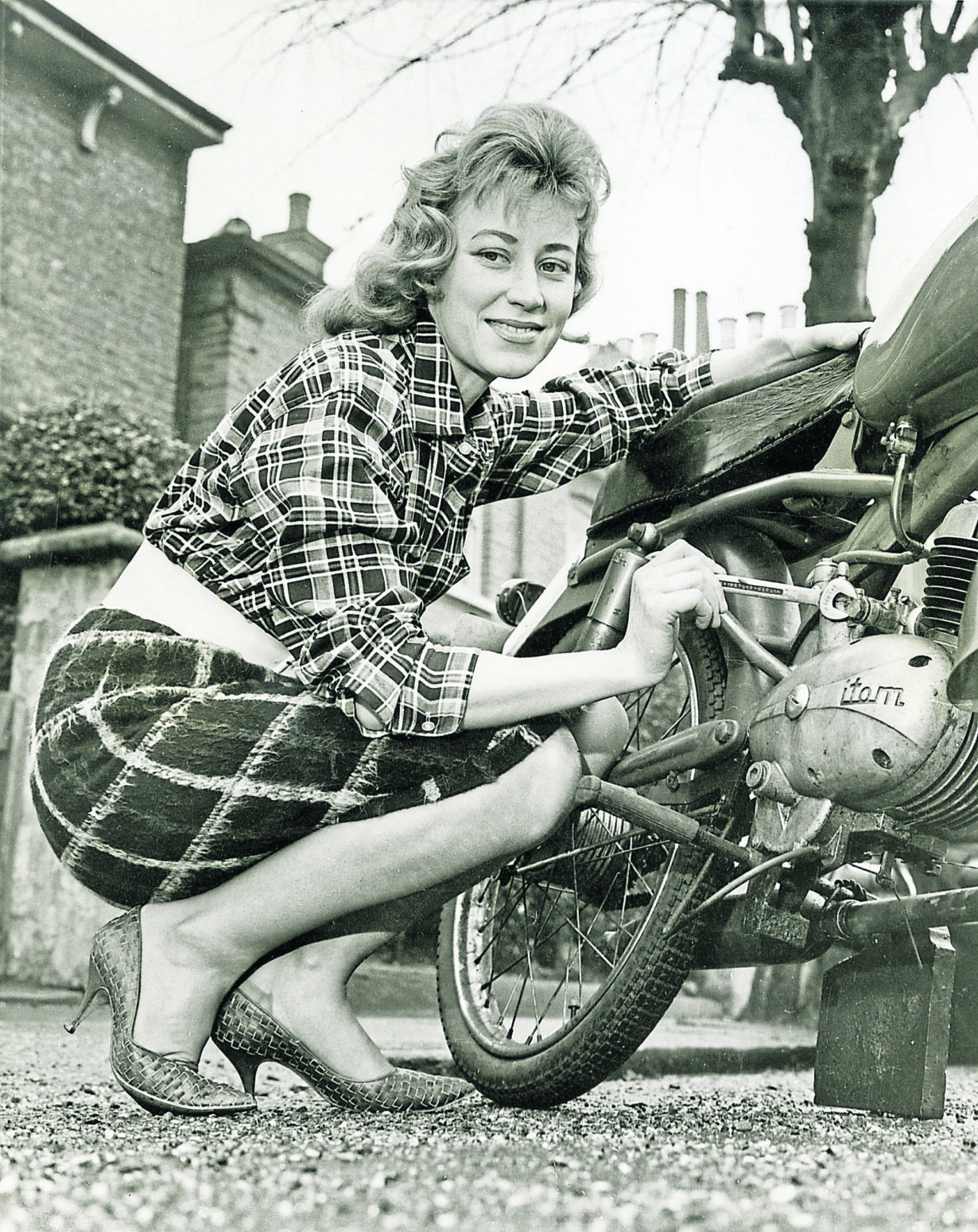 Beryl Swain; shorthand typist; 26; Leyton; London; Isle Of Man; TT; Motorcycle; championships; woman; competitor; 50cc; 1962