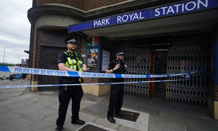 Woman dies after crash leaves Range Rover on Tube train track