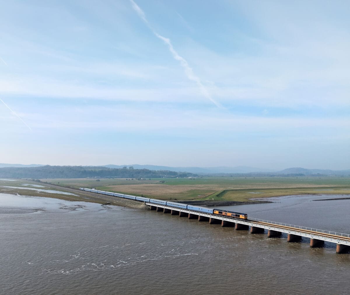 Drone shots need to be taken with full compliance with CAA regulations and you alsoneed to be wary of privacy rules. 66313 Lucie and 66748 St Michael’s Mount top-and-tail 1Z69, the 14.33 Carnforth-Barrow-in-Furness leg of the ‘Britannic Explorer’, headingover Arnside Viaduct towards Meathop and Grange-over-Sands on March 21. SteveSienkiewicz