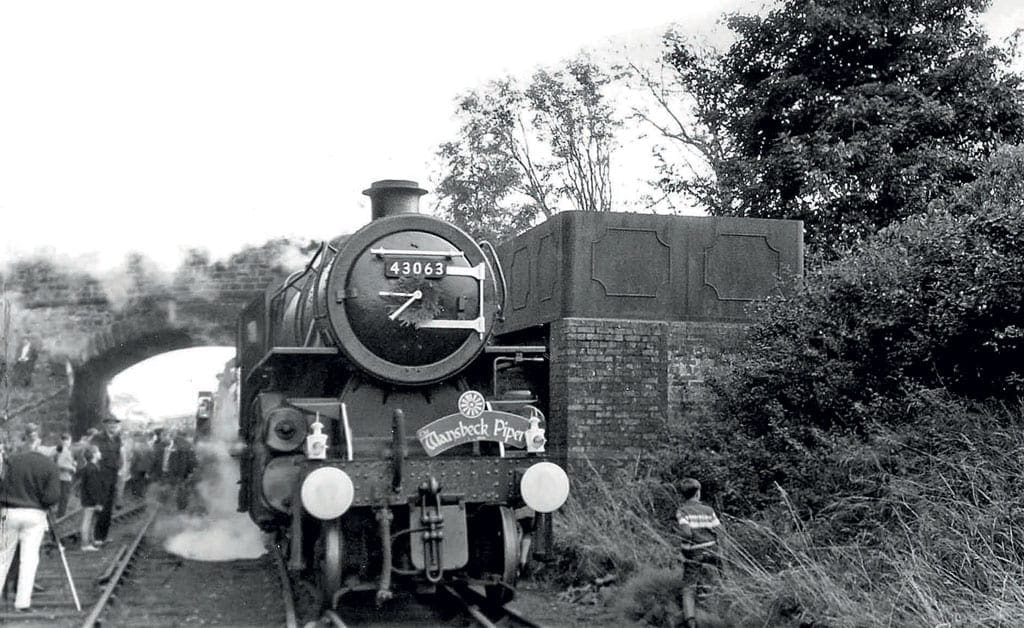 ‘The Wansbeck Piper’ stops at Scotsgap for the two locomotives to take water.