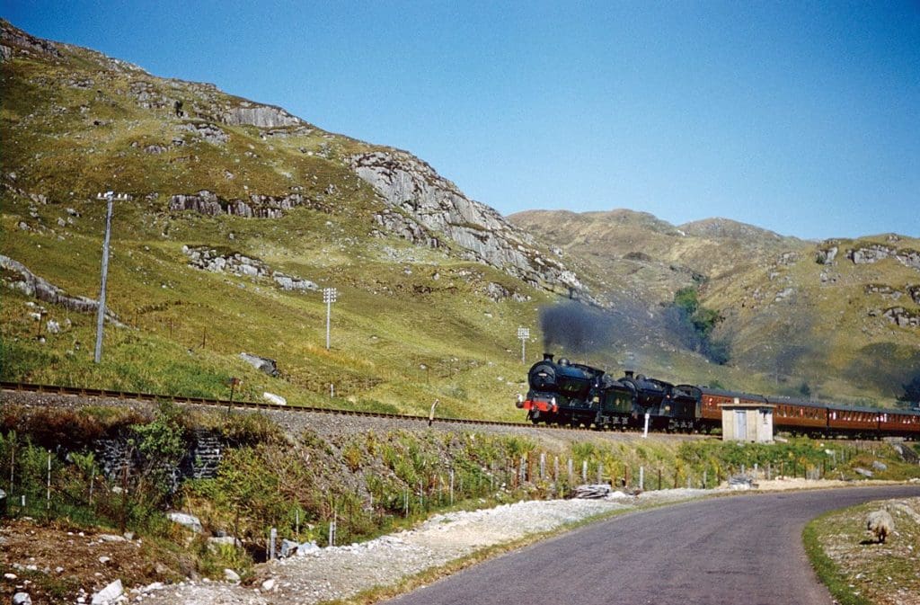 Heading for Mallaig at Arisaig, Nos 64592 and 64636 work the 'Jacobite' tour of 1 June 1963.