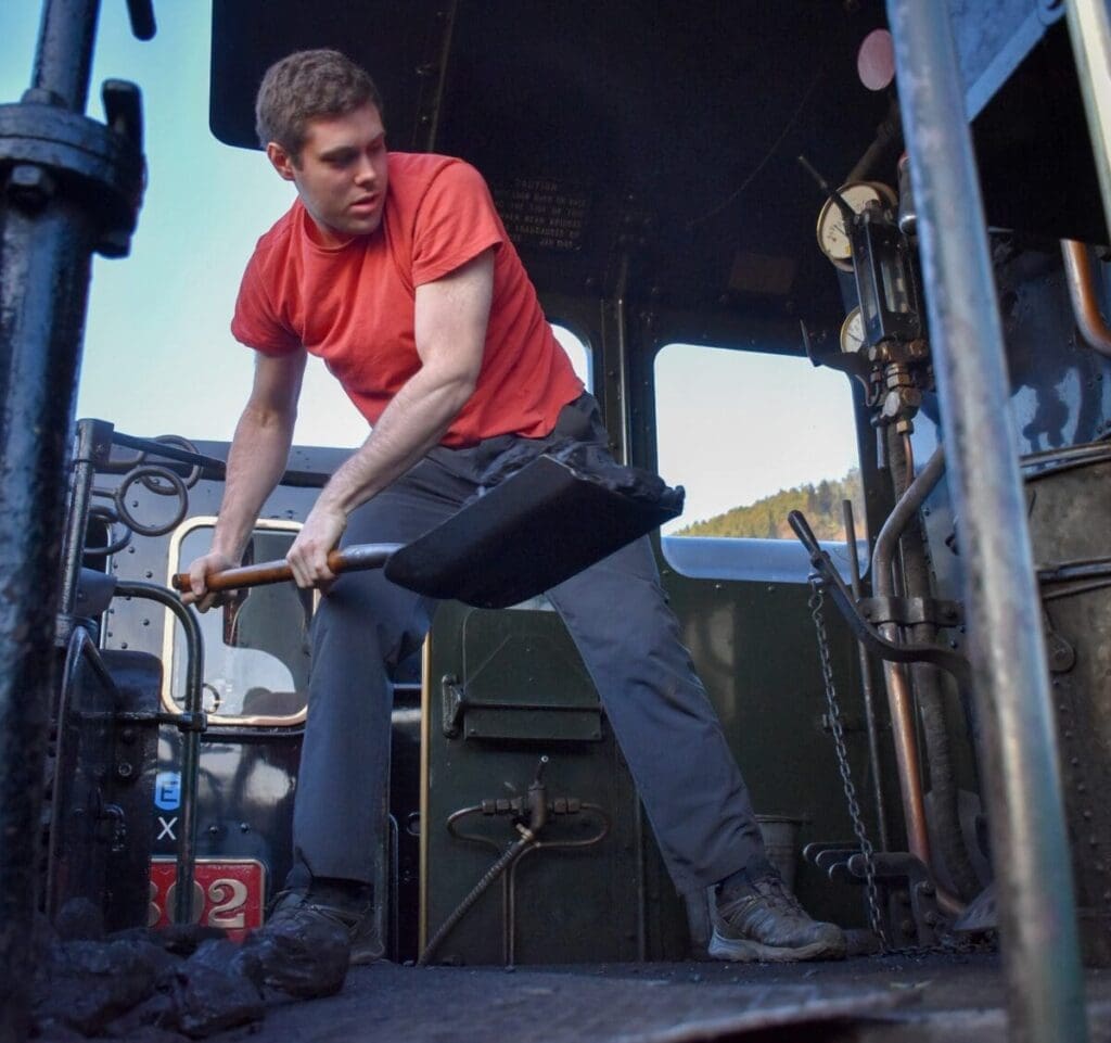 Step up as the fireman and keep the engine alive – shovelling coal, building pressure, and power ing the day at the Llangollen