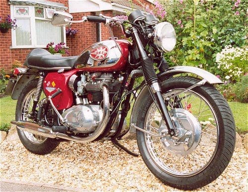 Nice bike, nice garden. Nice. Is that front mudguard meant to be like that?