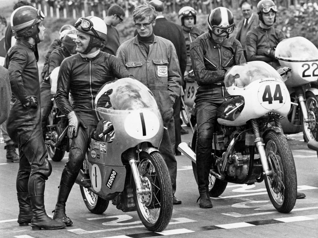 Images used by Lewis Leathers - Giacomo Agostini chats with Mike Hailwood (seated No. 1) on a 500cc Seeley, No. 44 Ken Redfern (745 Domiracer), No. 22 John Cooper (500cc Seeley) at Mallory Park 21st September 1969