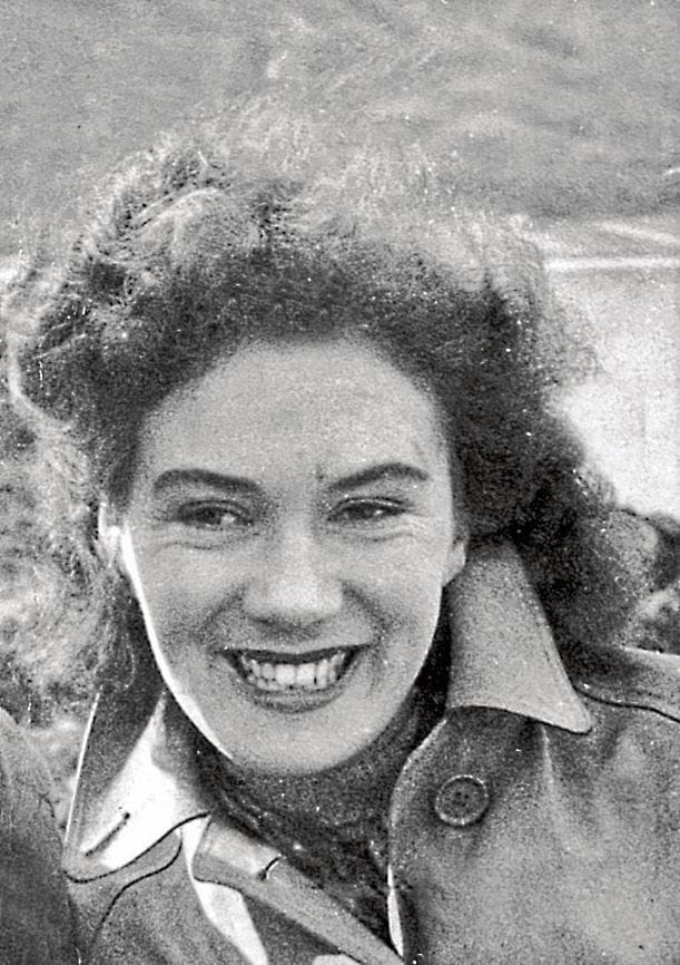 A close up of Olga Kevelos smiling.