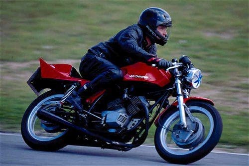 As rare as a rare thing which you don't get to see very often. This Valentini take on a Morini 350 has just struck a large blue daddy-long-legs.