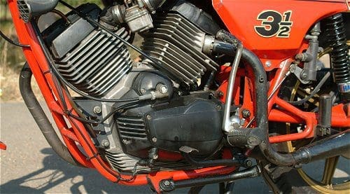Not so nice when viewed close up. Check out the kickstart 'rubber', the lack of exhaust heat shield, the patchy paintwork, the weeping il pressure switch...
