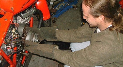 Note use of special flywheel-removing gloves...