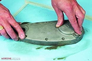 Refacing a motorcycle engine component