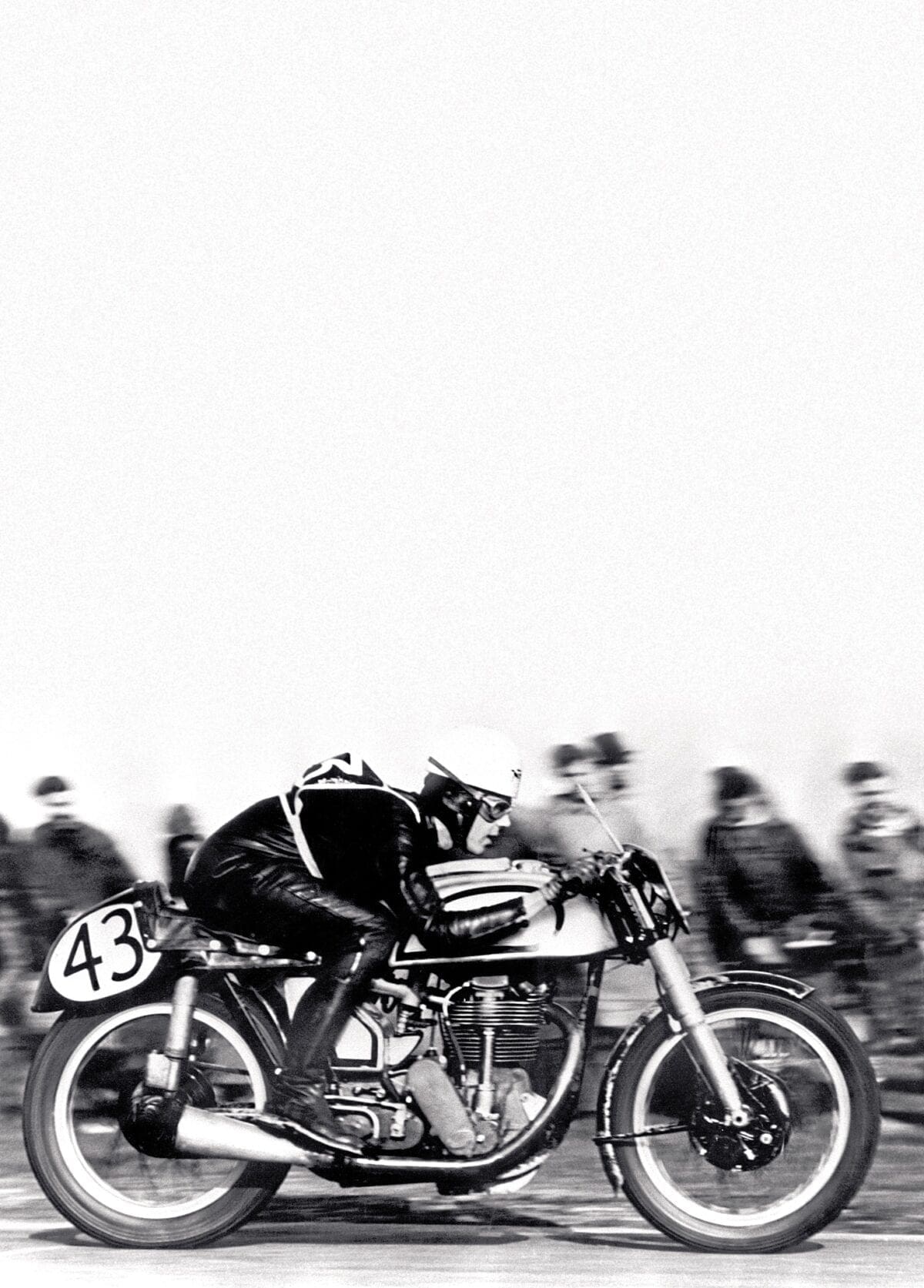 wd589468archive-duke-feath-1 The first postwar motorcycling superstar - Geoff Duke - The most famous Duke picture - it encapsulates a new era of the 'first' postwar motorcycle racer. One piece leathers, featherbed frame... Blandford Camp, featherbed debut, 1950.