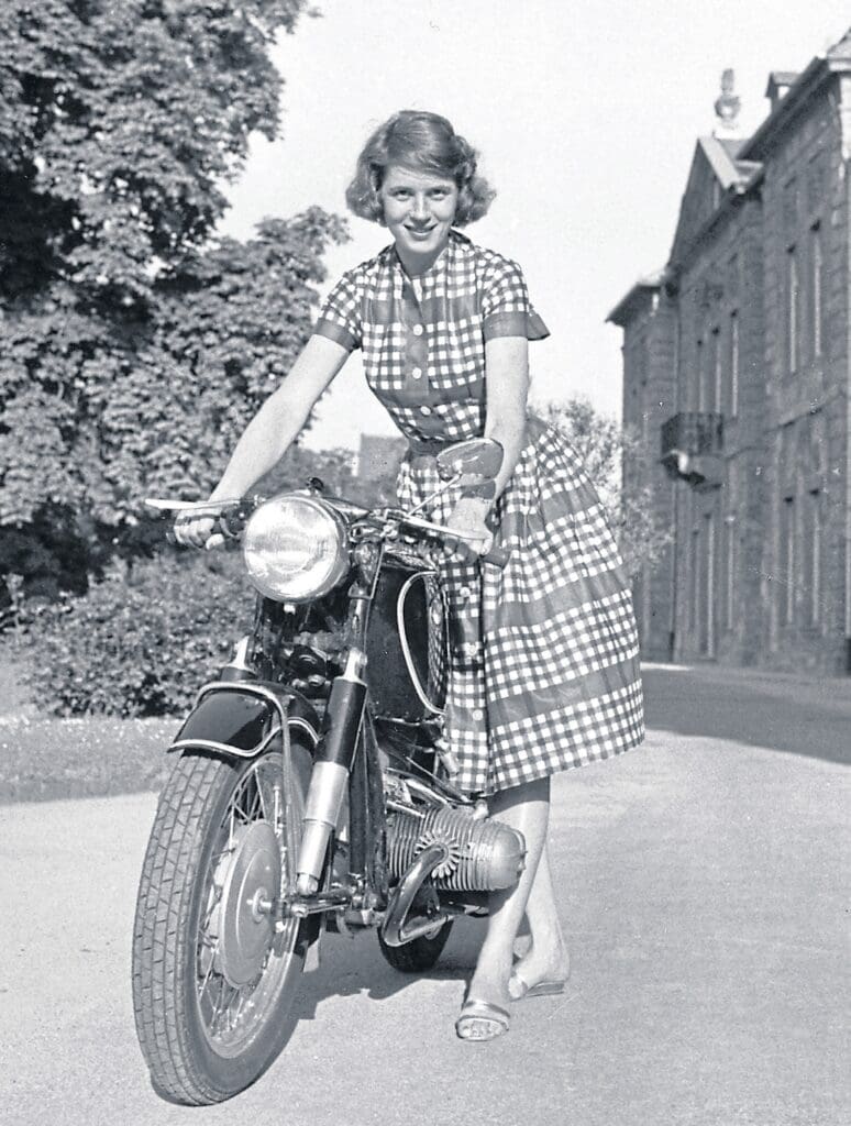 A rare photo of Anka-Eve in a frock.