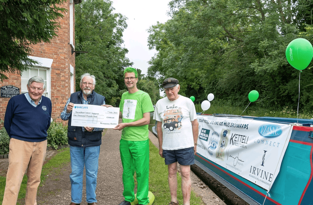 Music legend Pete Waterman presents Stuart with a cheque