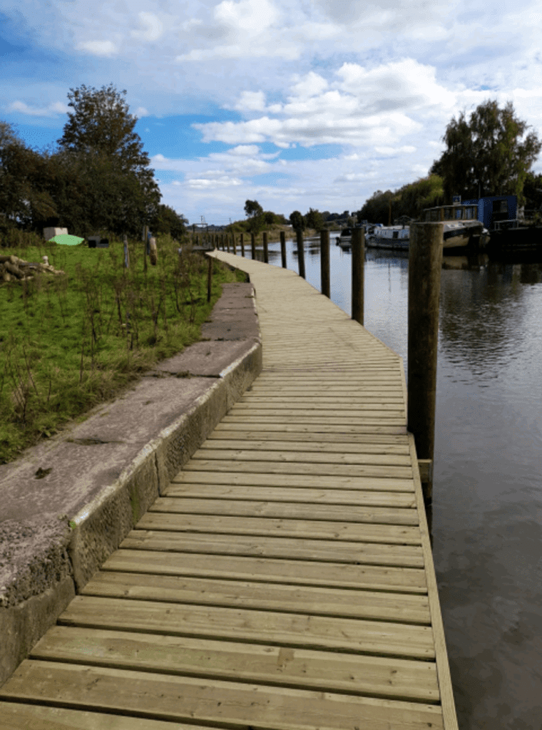 Moorings alongside the River Weaver.