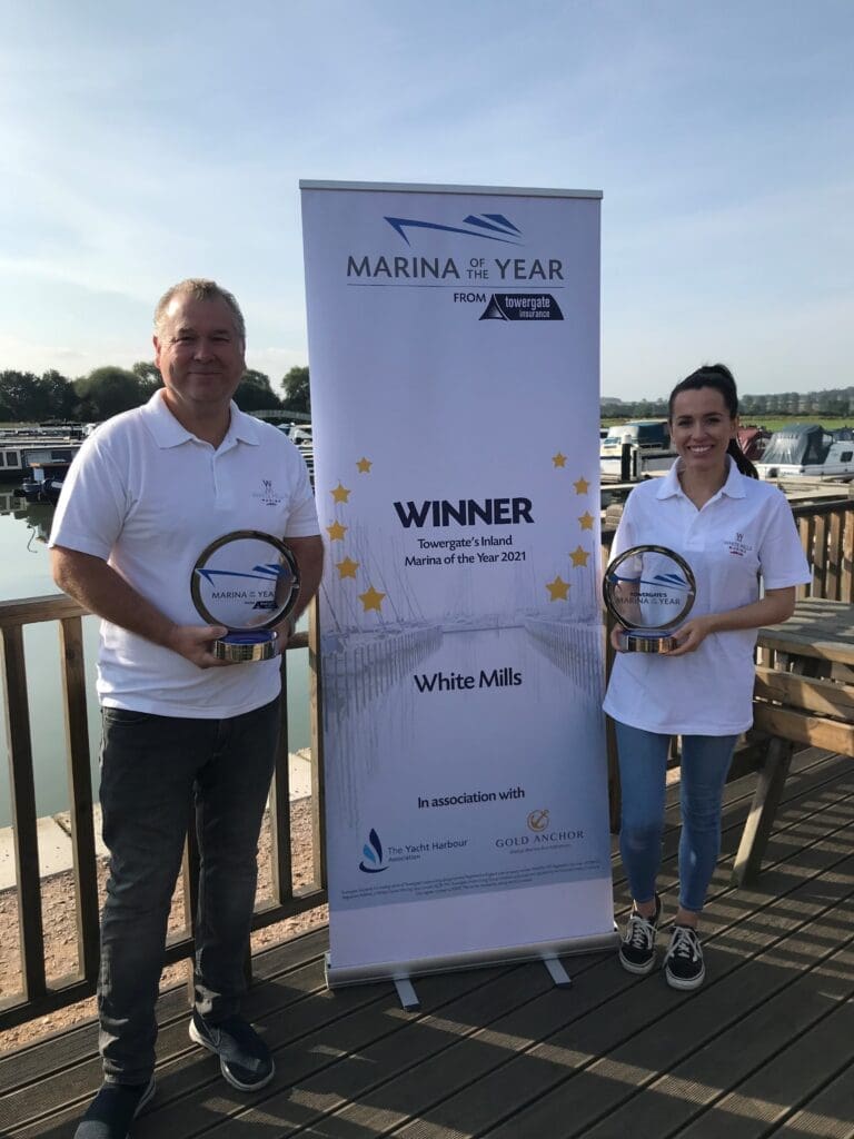 Operations manager Gary Butcher and marina administrator Kay Elderkin, with the 2020 and 2021 Inland Marina of the Year awards.