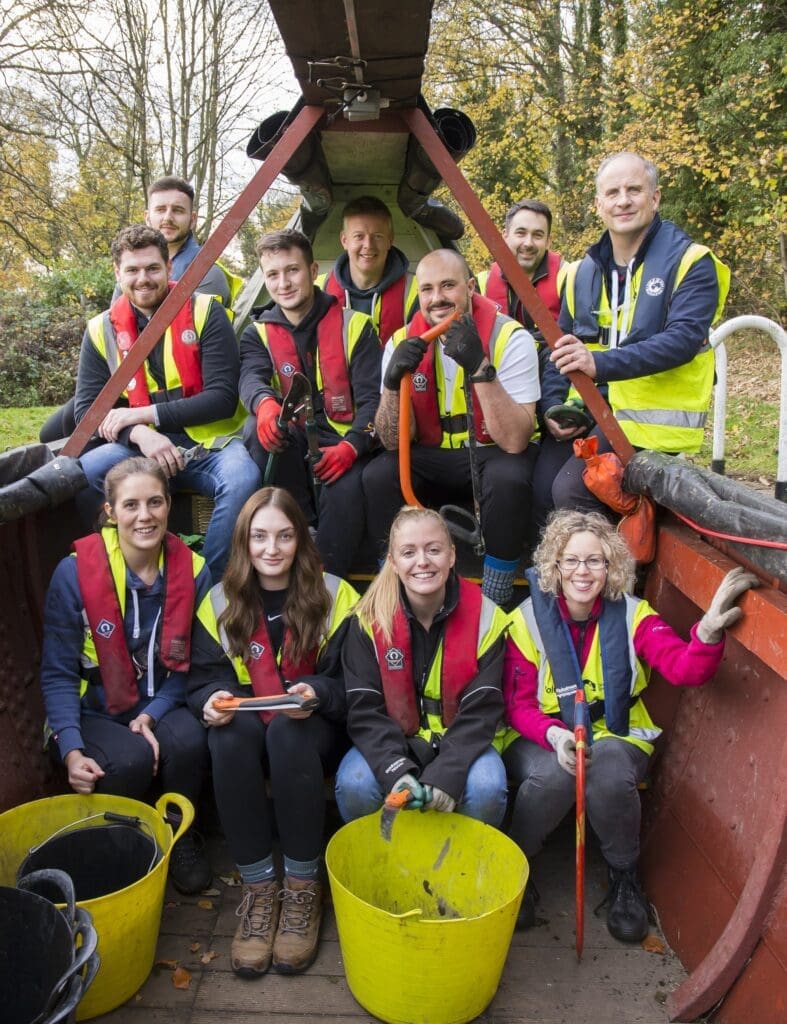 Volunteers on board a narrow boat during their volunteer day with Chesterfield Canal Trust