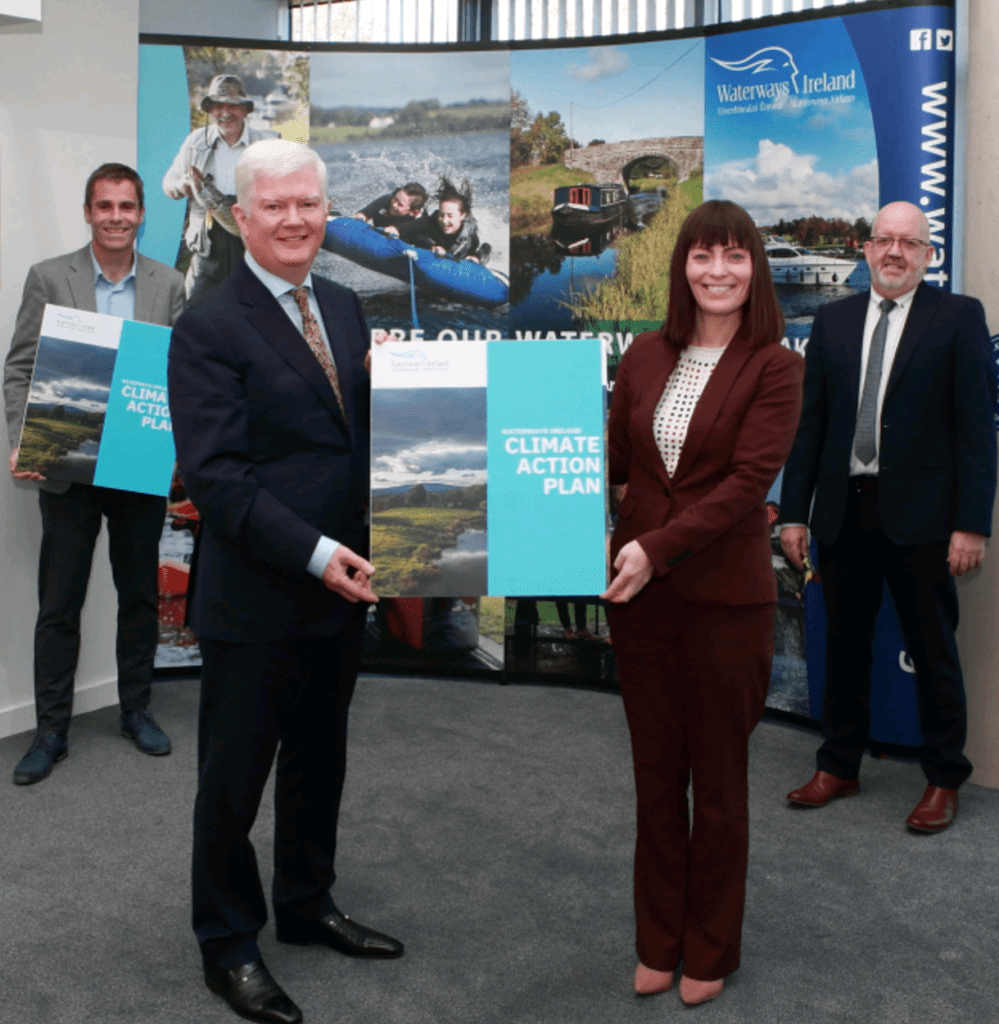 Waterways Ireland CEO John McDonagh presents the Climate Action Plan to Minister Nichola Mallon watched by environment officer Cormac McCarthy, left and director of technical services Joe McMahon, right