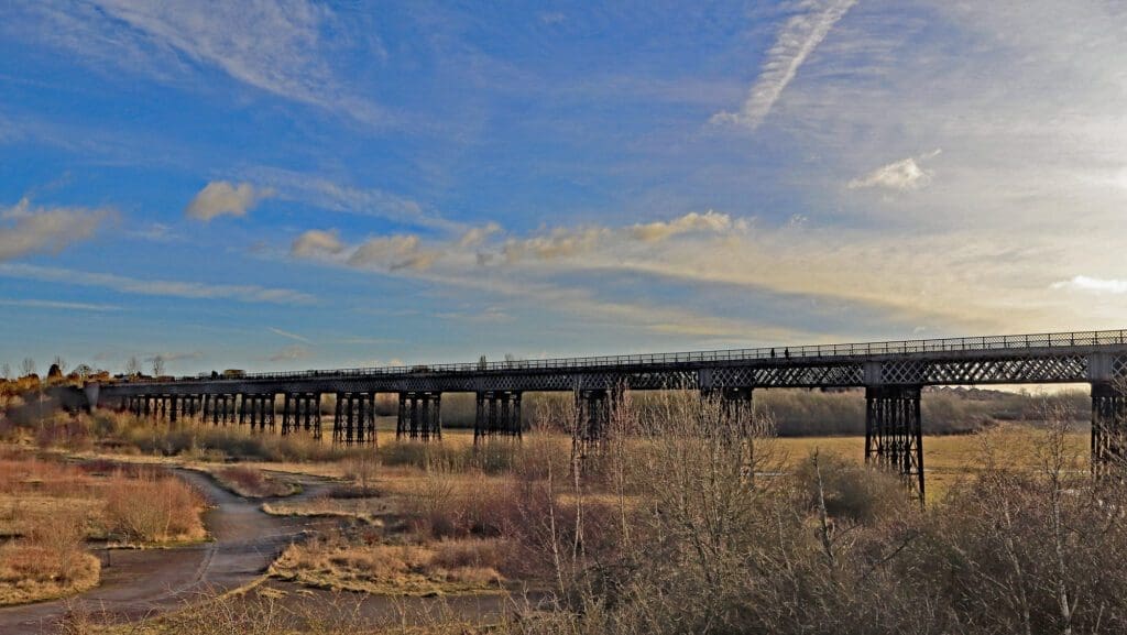 On a bright and crisp winter morning the Iron Giant stretches out across the valley of the River Erewash on the Nottinghamshire and Derbyshire border.