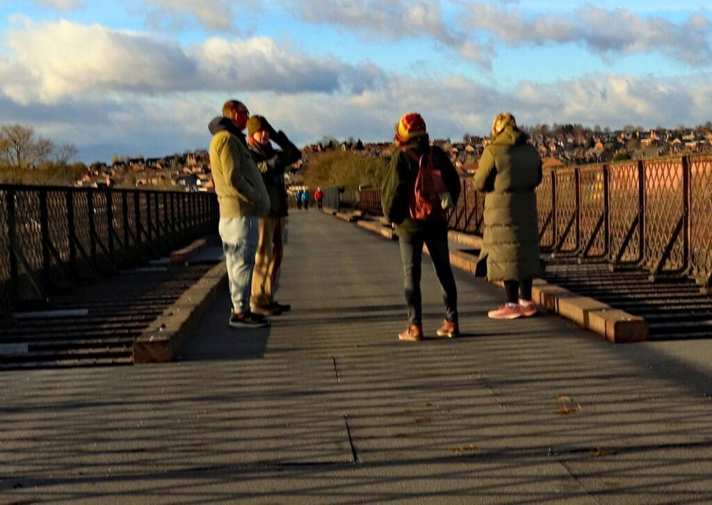 Walkers stop for a chat on the viaduct.