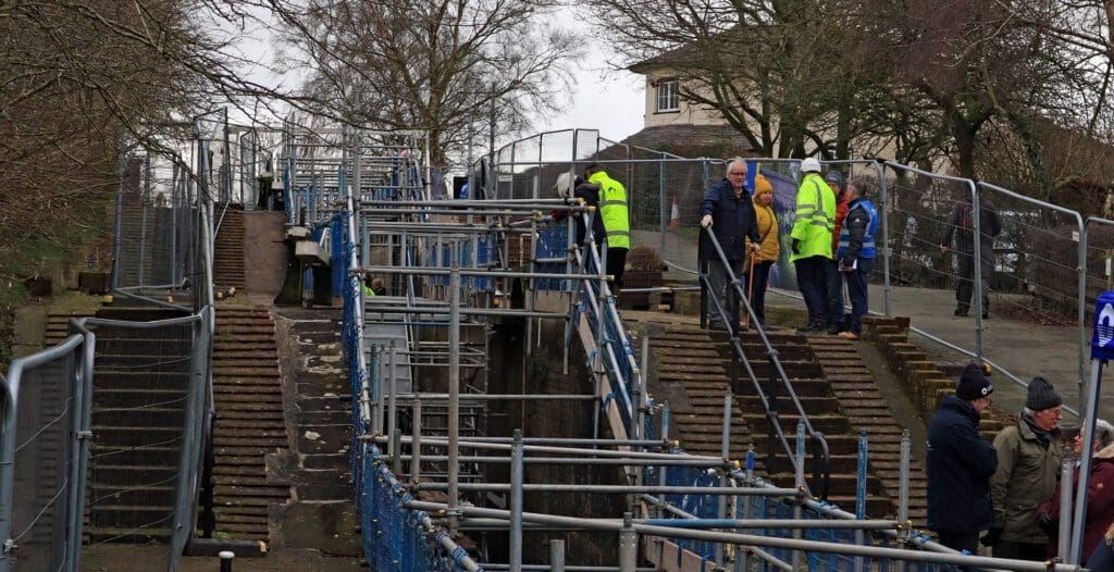 Scaffolding erected in the three-lock staircase to allow public access to inspect the drained locks.