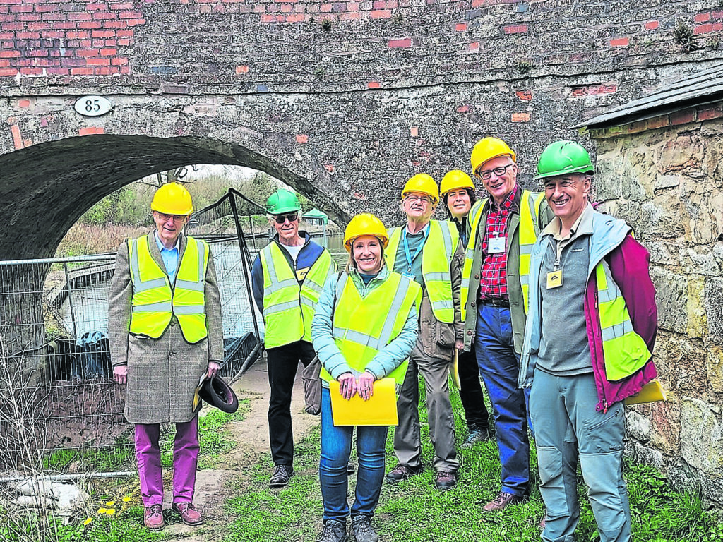 Helen Morgan MP, centre, at Crickheath Bridge with, from left: John Dodwell (Montgomery Canal Partnership), Clive Robertson (SUCS), Coun Roy Aldcroft (Shropshire Council), Claire Parsons (CRT), Michael Limbrey (MWRT) and Tom Fulda (SUCS).