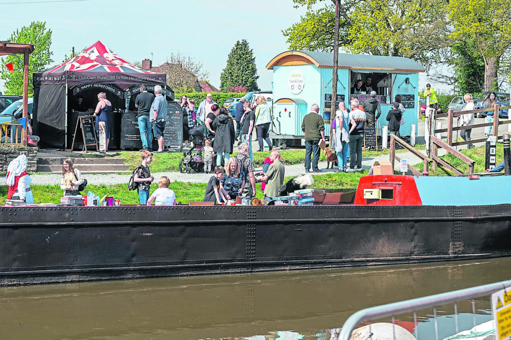 Norbury,  UK . 30th, April, 2022. Crowds enjoyed warm sunny weather on the first day of the Norbury Canal Festival being held for the first time in two years due to the pandemic. © Phil Pickin/ Alamy Live News