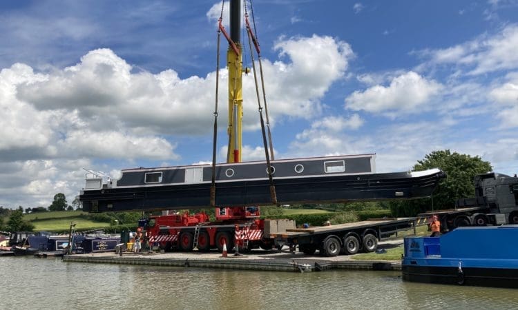 Boats craned in for Crick Boat Show