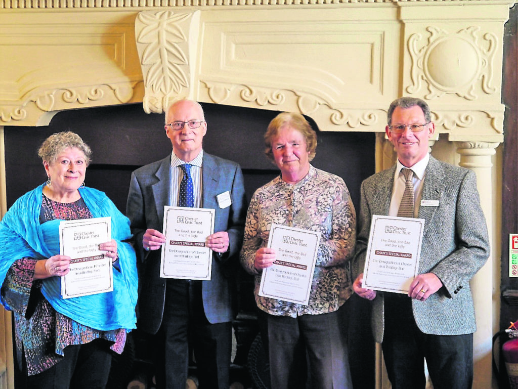 Displaying the special award are, from left: Christine Russell, John Herson, Ann Farrall and Jim Forkin.