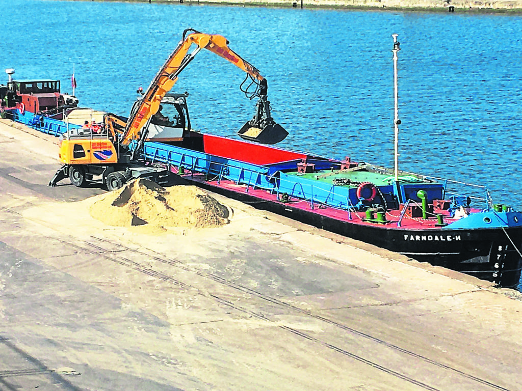 Farndale H loading sea-dredged sand in Albert Dock, Hull.