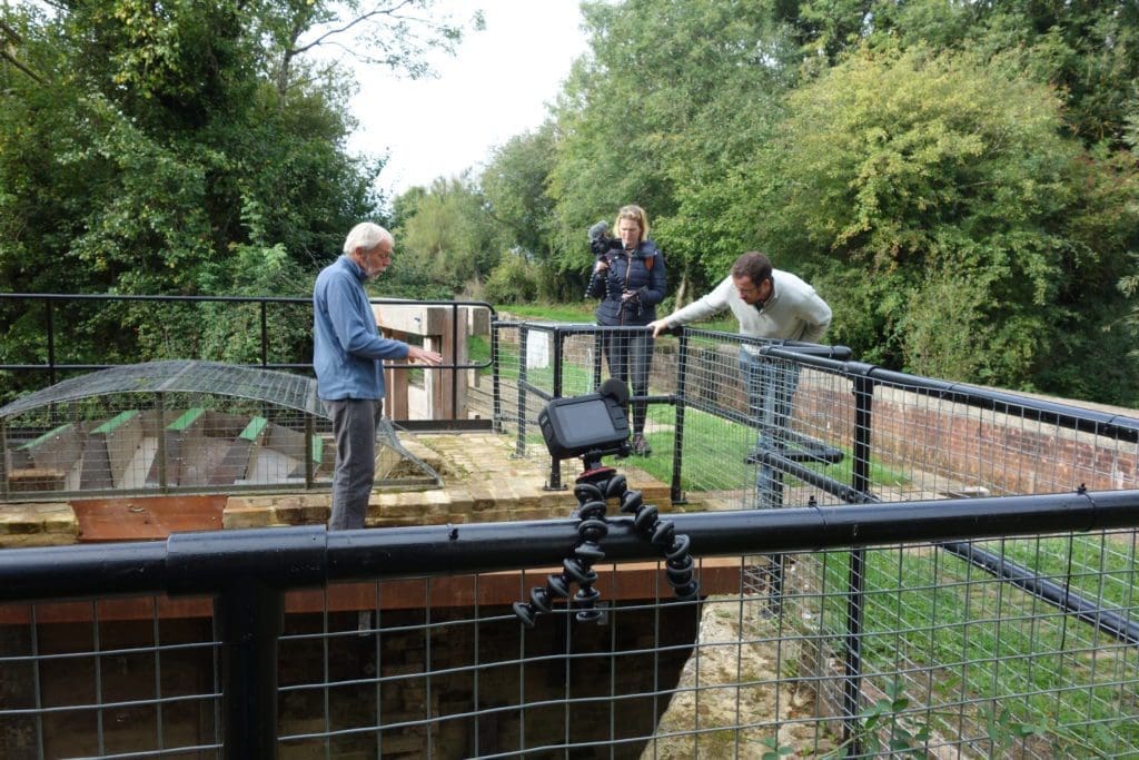 Brian King being inteviewed at the waterwheel by Paul and Rebecca Whitewick