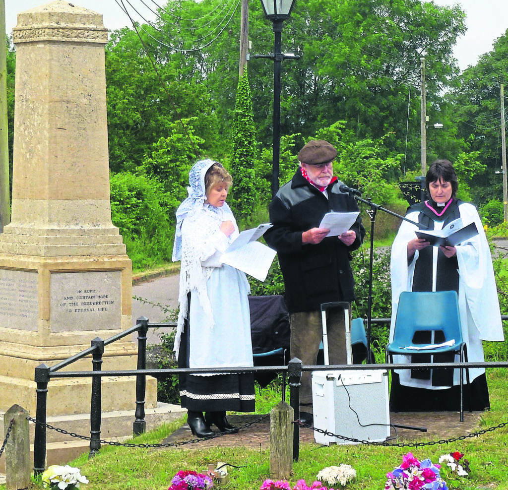 The Rev Sarah Brown presiding at a special service at Braunston’s war memorial in June 2014 to commemorate the 31 Braunston villagers who gave their lives in the First World War. Assisting her were actors and canal enthusiasts Prunella Scales and Timothy West who gave readings. 