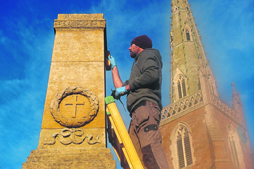 Master stonemason Steve Hancock putting the finishing touches to the makeover of Braunston’s war memorial.