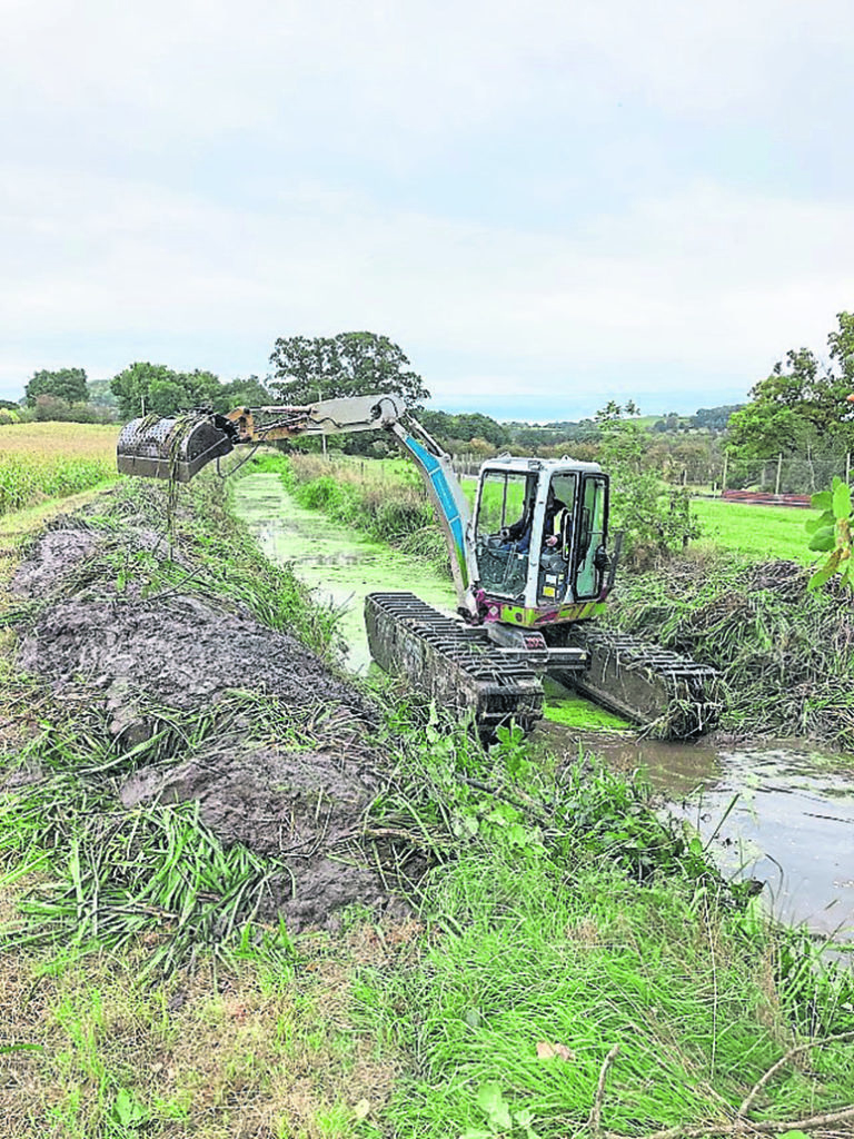 Amphibian dredging on the Tanat Feeder. PHOTO: MARK WEATHERALL/CRT