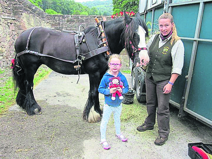 From the family album is Grace, granddaughter of John Guyler of the Friends of Cromford Canal, with Chelsea. PHOTOS SUPPLIED