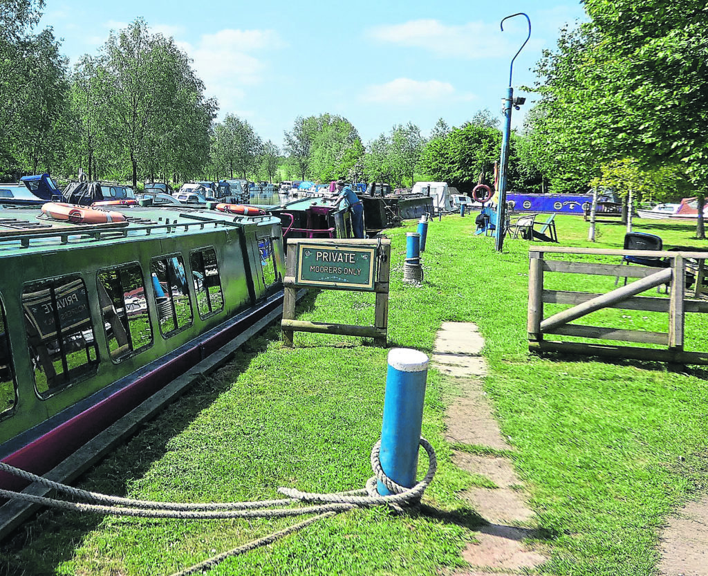 Painted bollards along the Chelmer & Blackwater Navigation.PHOTO: JANET RICHARDSON