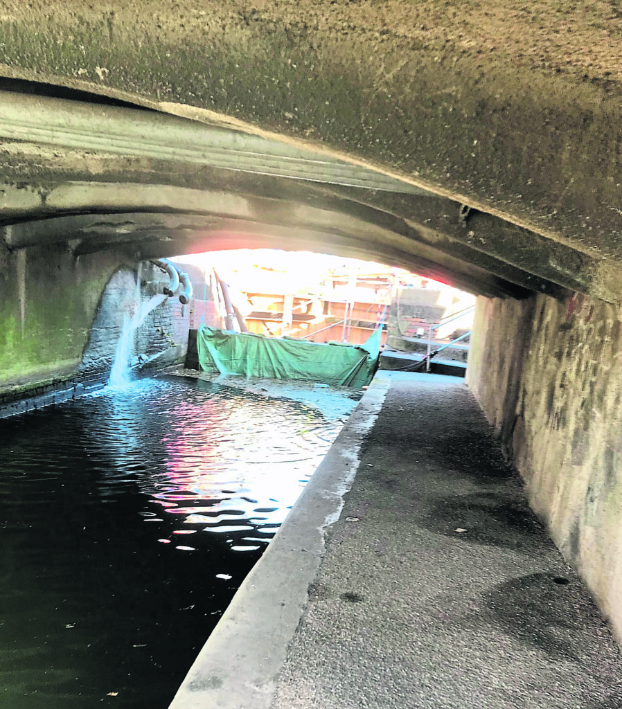 The dam keeping water away from the new lock gates beneath the A6007 road.