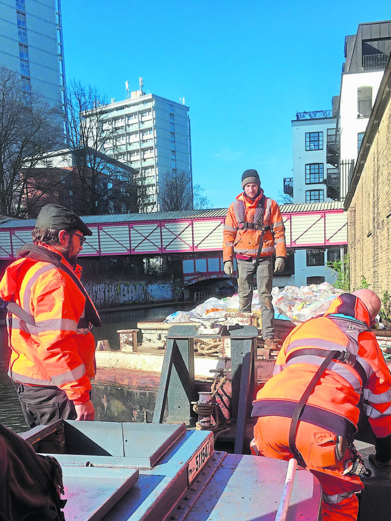 Hitching up the rubbish barge ahead of the Bantam tug.