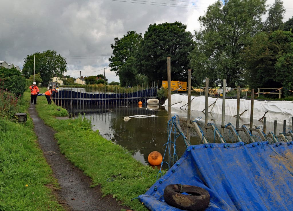 The dammed-off Leeds and Liverpool over a culvert between bridges 32 and 31 near Burscough in West Lancashire on Monday, 17.7.2023.