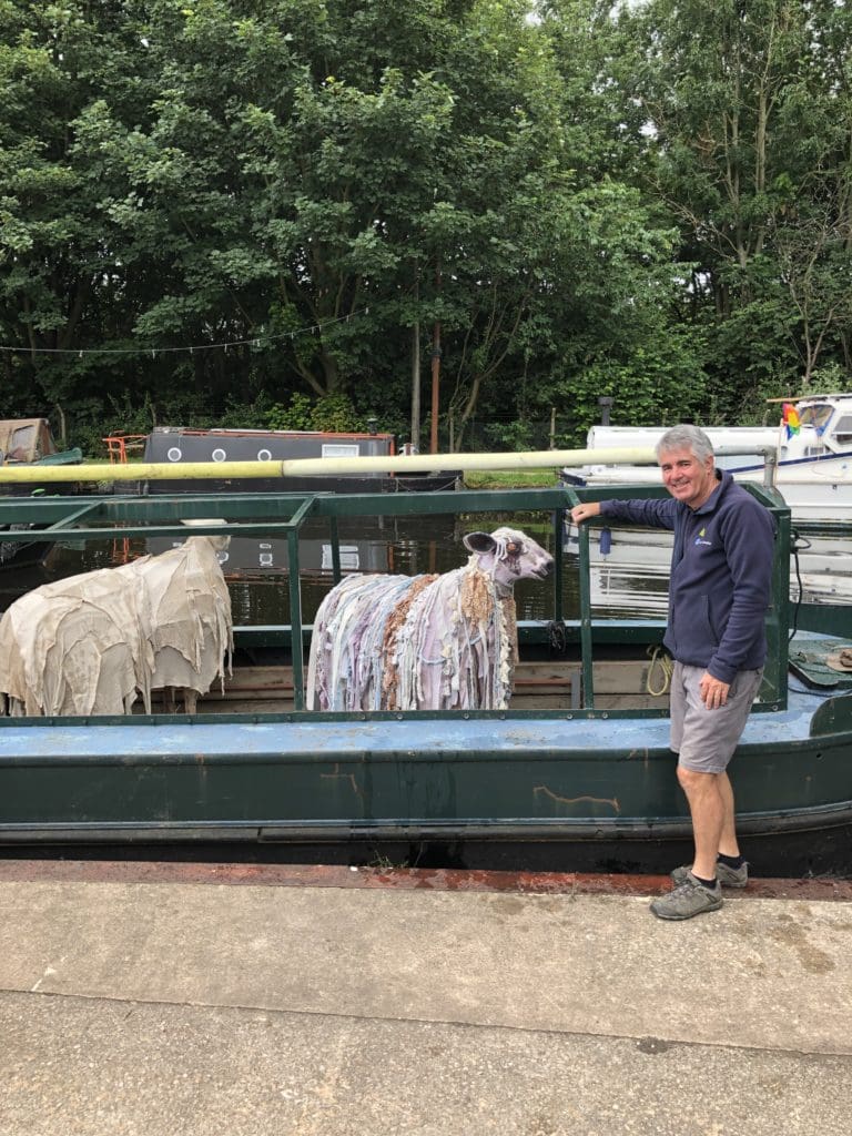 Floating fleeces:- Vedero and Wix onboard Lady Brenda with Jeff Trigg, Trustee with the Safe Anchor Trust. Photo Sally Clifford.