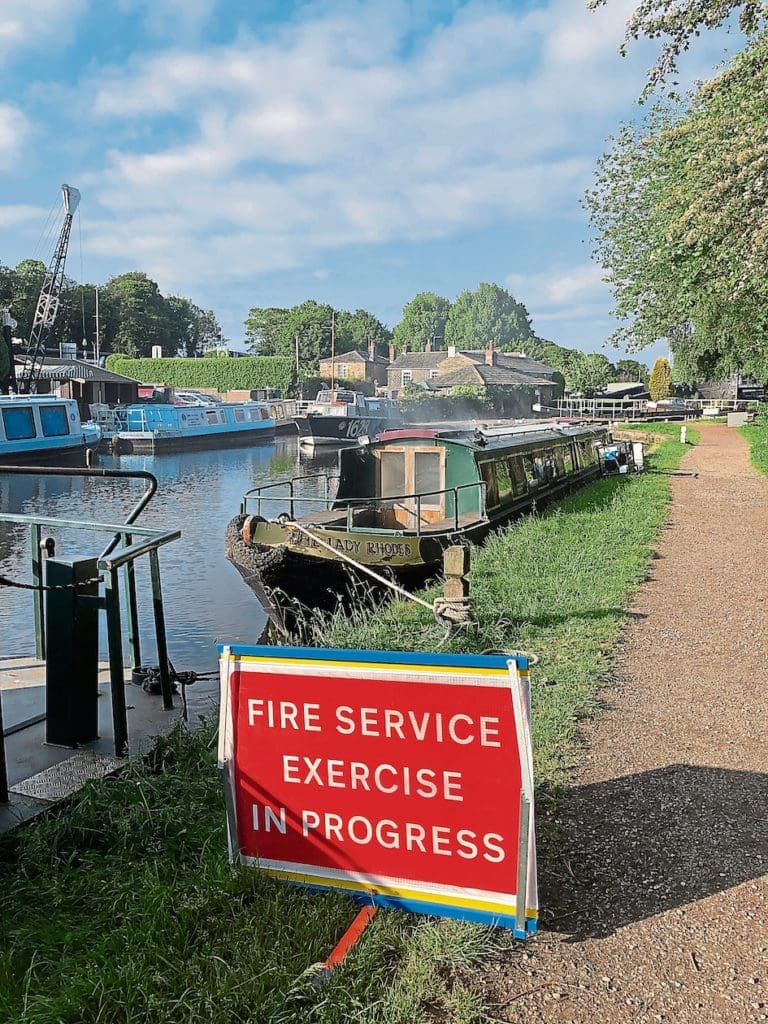 The sign says it all – the fire safety exercise is underway.