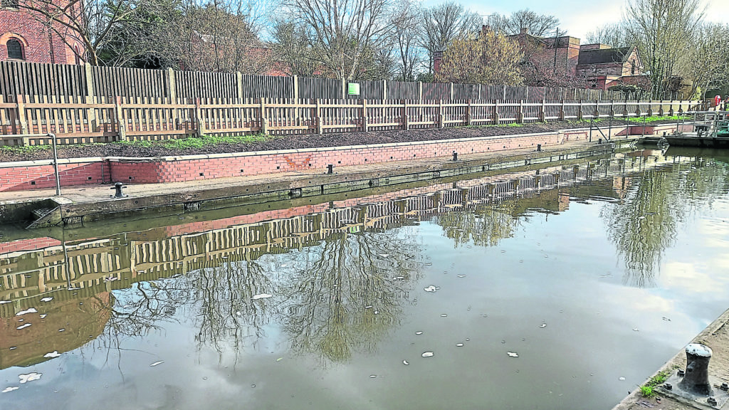 New fence at Romney lock made from hardened softwood.