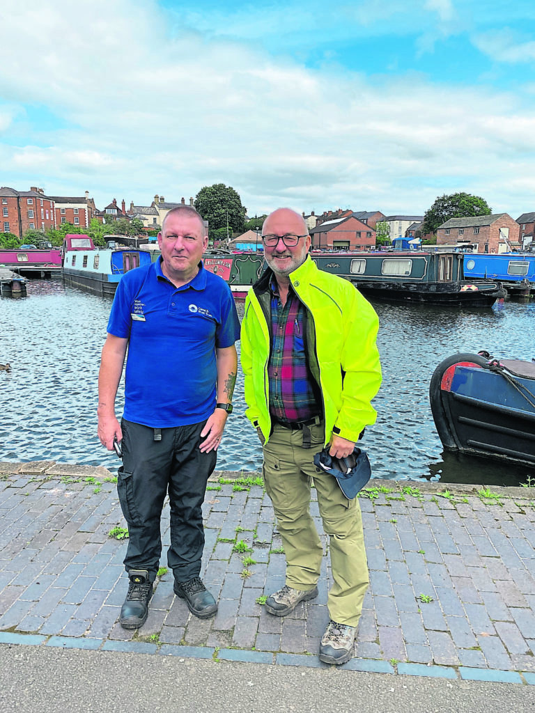 Andy Griffee, right, spends the day with licensing ranger Steve Broad.