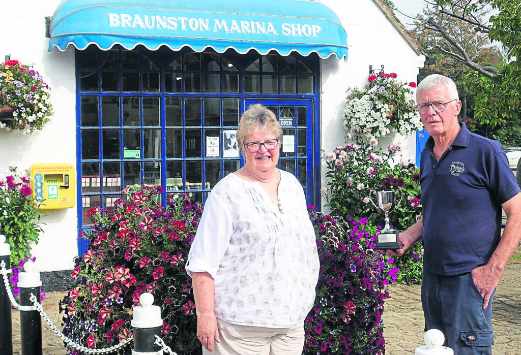 Debbs Bradshaw and Ian Norris with the Dennett’s Garden Centre Cup.