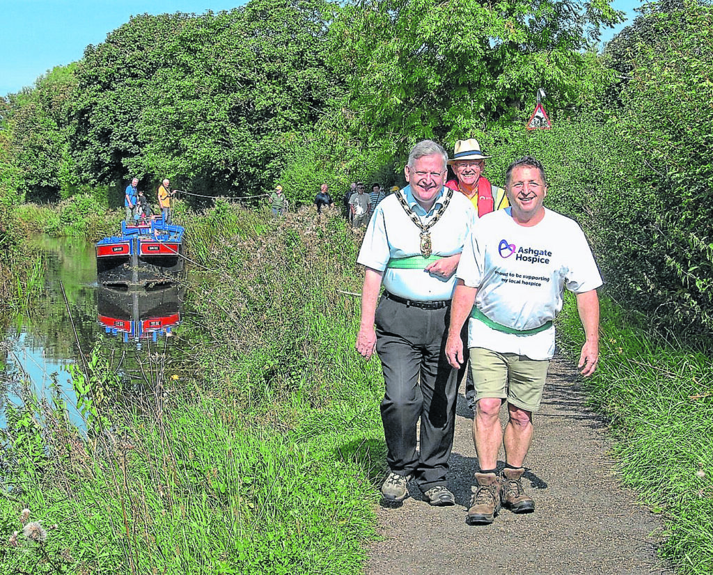 Coun Martin Thacker, left, and supporters pulling Dawn Rose from Shireoaks to Worksop and back.