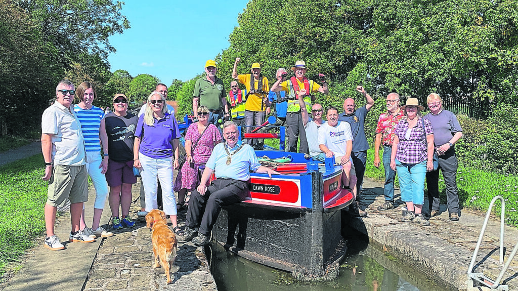 The North East Derbyshire District Council boat pull team with Dawn Rose volunteers.