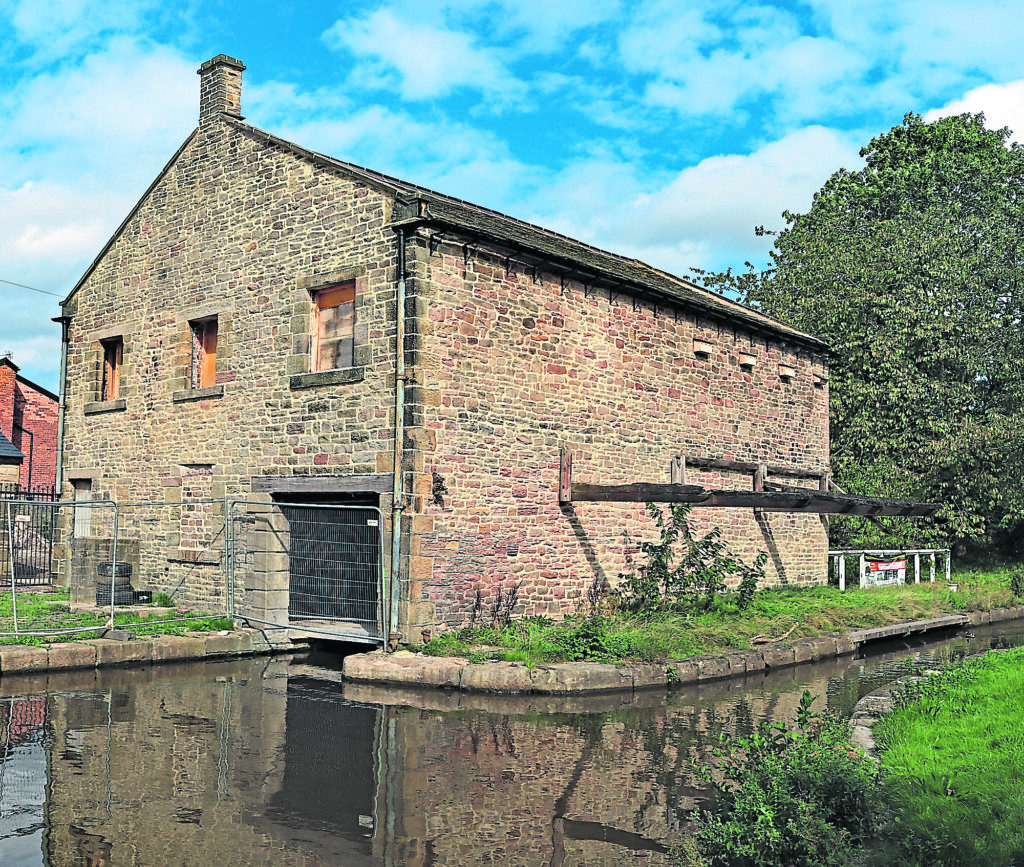The former wharf warehouse – a Grade II listed building – is being renovated to serve as a community space with a heritage and health and well-being centre. Work is ongoing on the roof and stonework. 