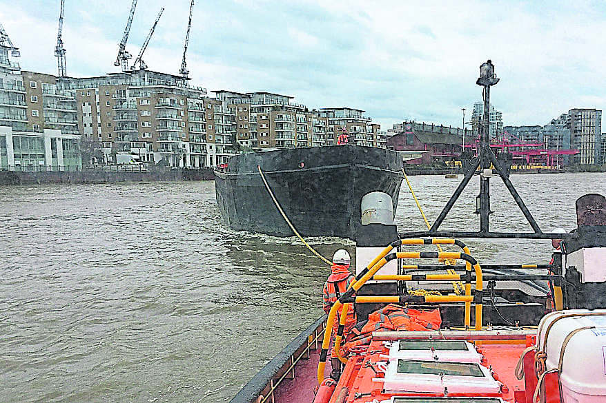 An empty Thames barge riding high in the water but which, when full, can carry 1500 tonnes.