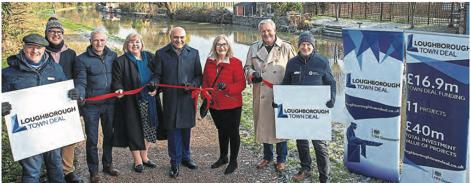 Celebrating the reopening of the revamped towpath are, from left: Richard Erwin-Jones, Canal & River Trust; Chris Grace, Charnwood Borough Council’s head of economic development and regeneration; David Pagett-Wright, Loughborough Town Deal board member; Jane Hunt, MP for Loughborough and Town Deal board member; Dr Nik Kotecha, chairman of the Loughborough Town Deal board; Coun Jennifer Tillotson, Charnwood Borough Council’s lead member for economic development, regeneration and town centres and Town Deal board member; Lez Cope Newman, Town Deal board member and Alan Leather, Canal & River Trust. PHOTO: CANAL & RIVER TRUST